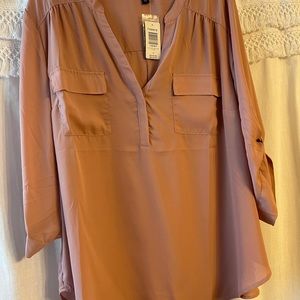 Torrid size 3 blouse. Deep V with button sleeves. New with tags.